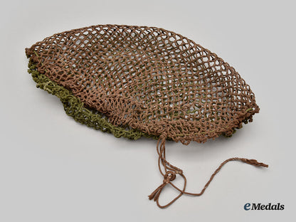 canada,_commonwealth._a_mark_ii_brodie_helmet,_with_camo_helmet_netting_and_repair_kit_l22_mnc7619_971