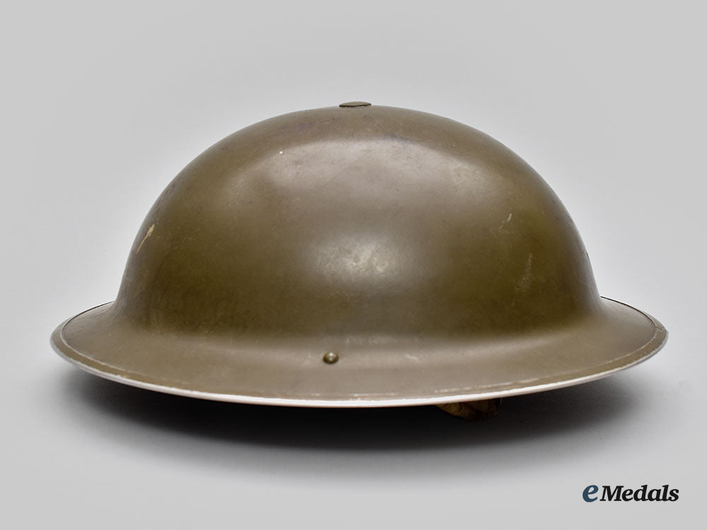 canada,_commonwealth._a_mark_ii_brodie_helmet,_with_camo_helmet_netting_and_repair_kit_l22_mnc7631_976