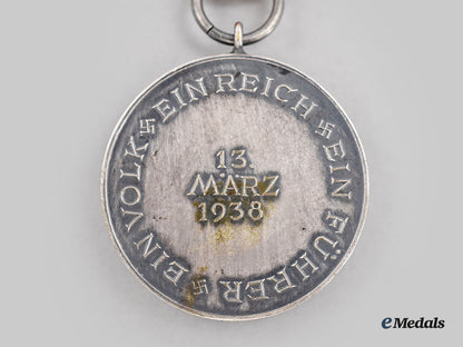 germany,_ss._an_anschluss_medal,_with_award_document,_to_ss-_sturmbannführer_eberhard_freiherr_von_künsberg_l22_mnc8140_038