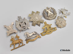 United Kingdom. A Lot Of Nine Cap Badges