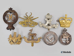 United Kingdom. A Lot Of Eight Cap Badges