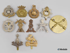 United Kingdom. A Lot Of Eleven Cap Badges