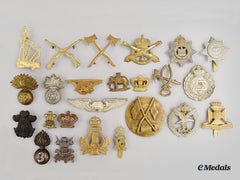 United Kingdom. A Lot Of Twenty-Four Cap Badges And Collar/Shoulder Insignia