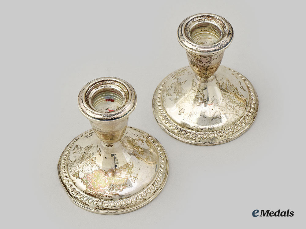 canada,_dominion._a_pair_of_weighted_silver_candle_holders,_by_birks_l22_mnc8831_400_1
