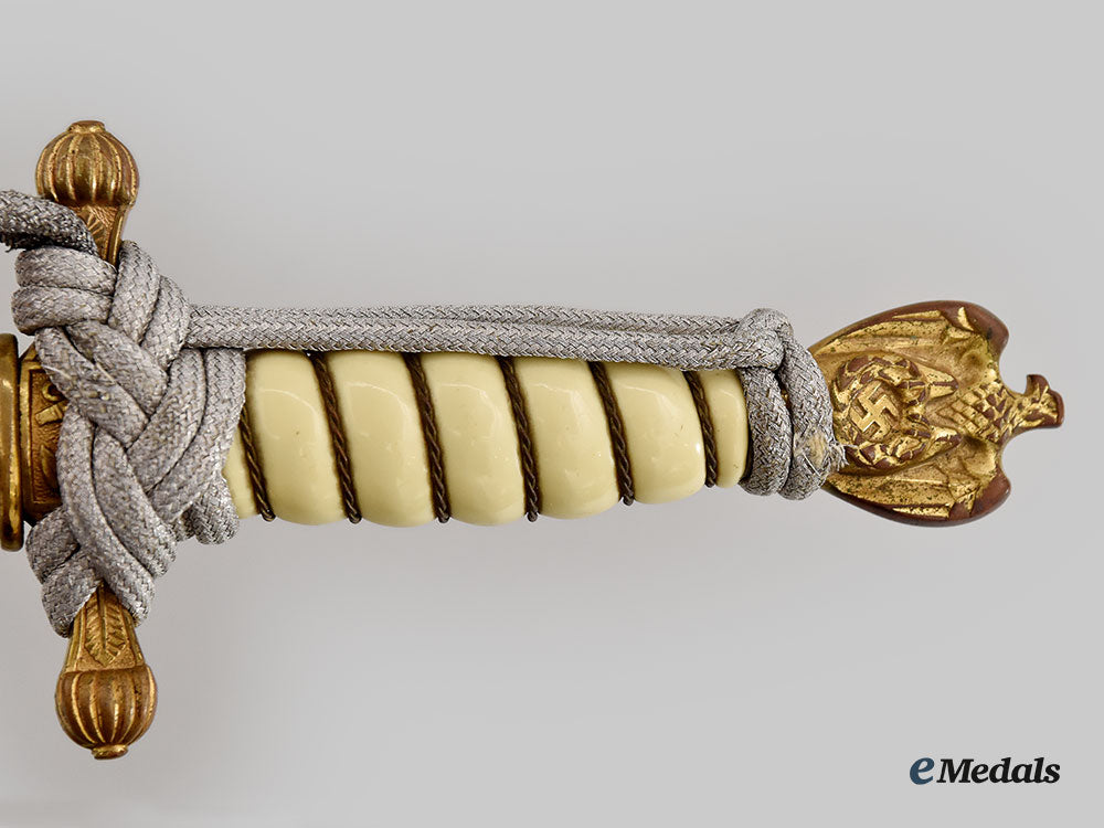 germany,_kriegsmarine._an_officer’s_dagger,_with_hanger,_by_carl_eickhorn_l22_mnc8921_513_1