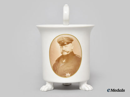 germany,_imperial._a_clawfoot_porcelain_mug_with_hindenburg_portrait,_by_kpm_l22_mnc9137_401_1