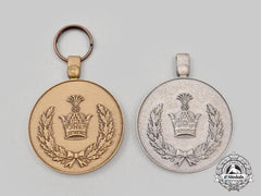 Iran, Pahlavi Dynasty. Two Medals From The Reza Shah Era Manufactured By Sporrong Of Sweden