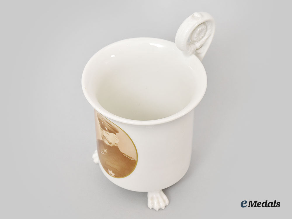 germany,_imperial._a_clawfoot_porcelain_mug_with_hindenburg_portrait,_by_kpm_l22_mnc9141_397_1