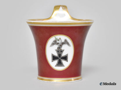 germany,_imperial._a_red_glazed_porcelain_iron_cross_mug,_by_furstenberg_l22_mnc9146_395_1