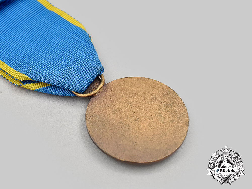 iran,_pahlavi_dynasty._a_medal_for_the_fiftieth_anniversary_of_the_pahlavi_dynasty1976,_fullsize_and_miniature_l22_mnc9148_551