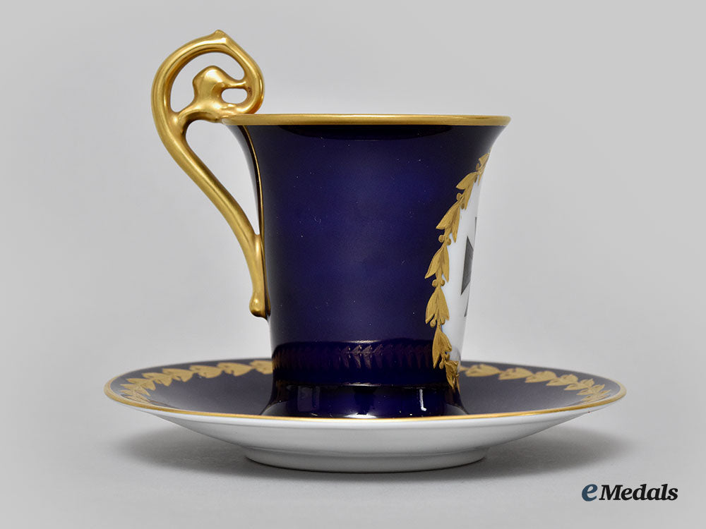germany,_imperial._a_blue_glazed_iron_cross_teacup_and_saucer_set,_by_rosenthal,_selb_l22_mnc9161_386_1