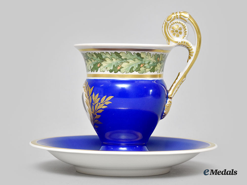 germany,_imperial._a_blue_glazed_iron_cross_motif_teacup_set,_by_kpm_l22_mnc9195_366