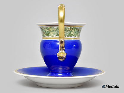 germany,_imperial._a_blue_glazed_iron_cross_motif_teacup_set,_by_kpm_l22_mnc9196_365