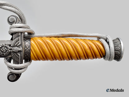 germany,_heer._an_officer’s_dress_dagger,_with_postwar_storage_case_and_cap_eagle,_by_stöcker&_co._l22_mnc9198_074