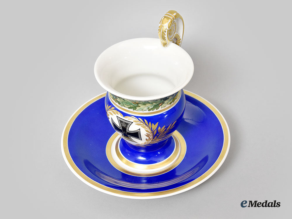 germany,_imperial._a_blue_glazed_iron_cross_motif_teacup_set,_by_kpm_l22_mnc9201_363