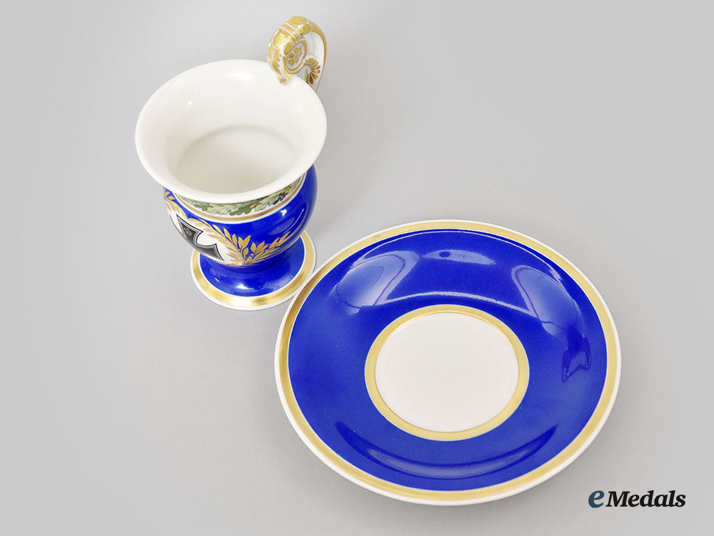 germany,_imperial._a_blue_glazed_iron_cross_motif_teacup_set,_by_kpm_l22_mnc9203_362