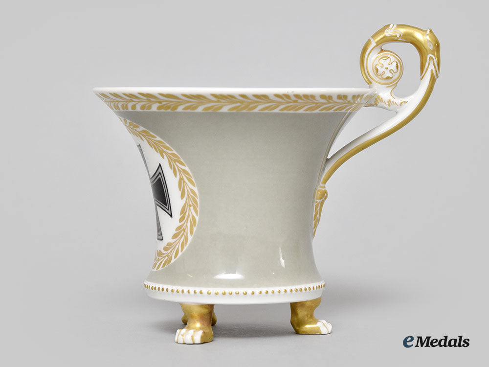 germany,_imperial._a_small_grey_glazed_clawfoot_teacup,_by_kpm_l22_mnc9209_358