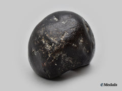International. A Perforated Stone Tool
