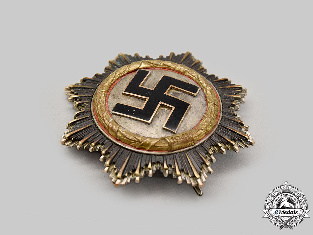 germany,_wehrmacht._a_german_cross_in_gold,_heavy_version,_by_c.e._juncker_l22_mnc9224_626