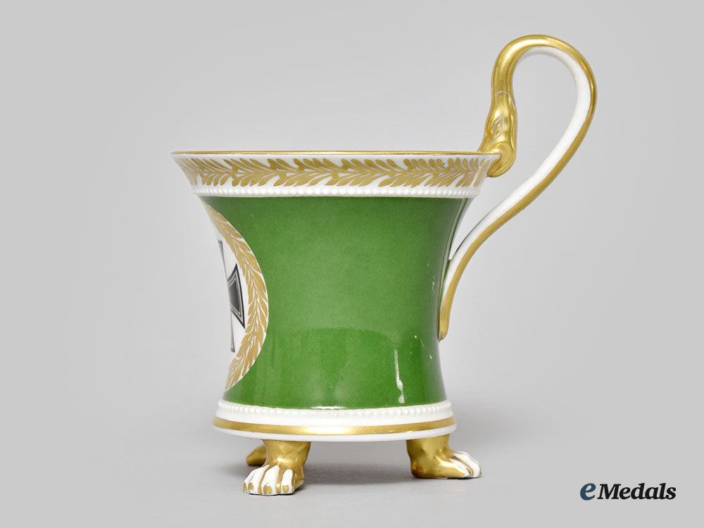 germany,_imperial._a_green_glazed_clawfoot_teacup,_by_kpm_l22_mnc9239_343