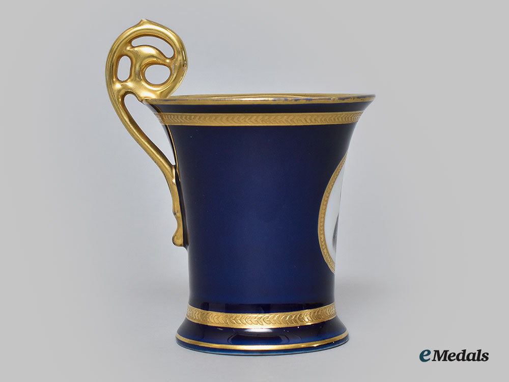 germany,_imperial._a_blue_glazed_teacup_with_hindenburg_portrait,_by_pt_tirschenreuth,_c.1930_l22_mnc9278_659