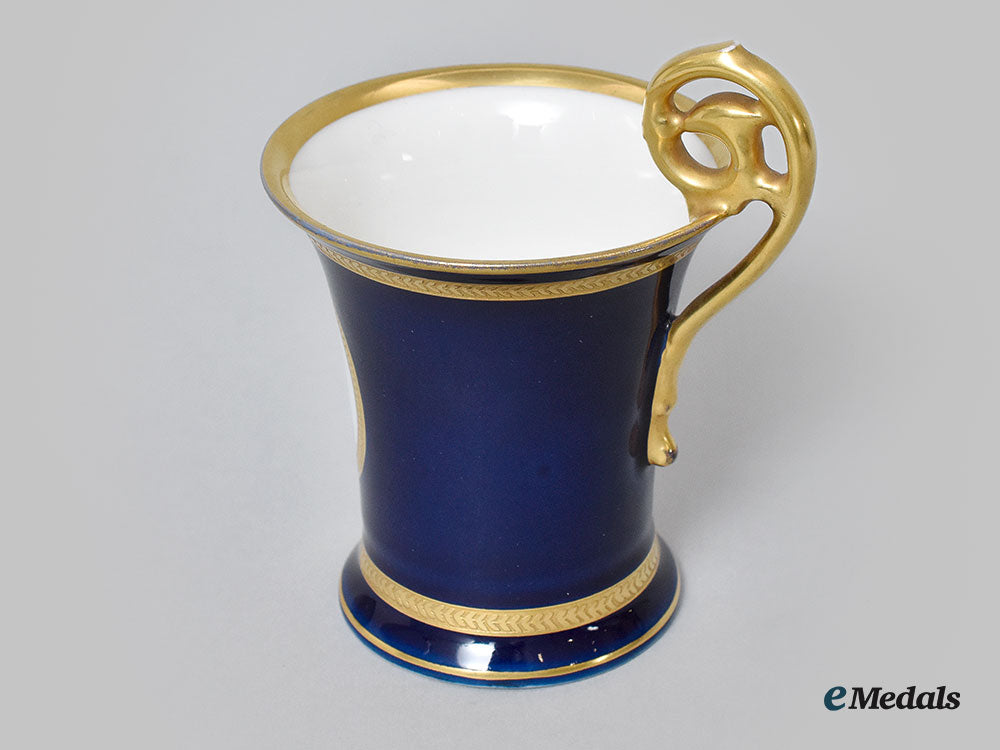 germany,_imperial._a_blue_glazed_teacup_with_hindenburg_portrait,_by_pt_tirschenreuth,_c.1930_l22_mnc9284_656