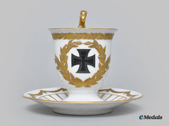 Germany, Imperial. An Iron Cross Teacup And Saucer Set, By Rosenthal