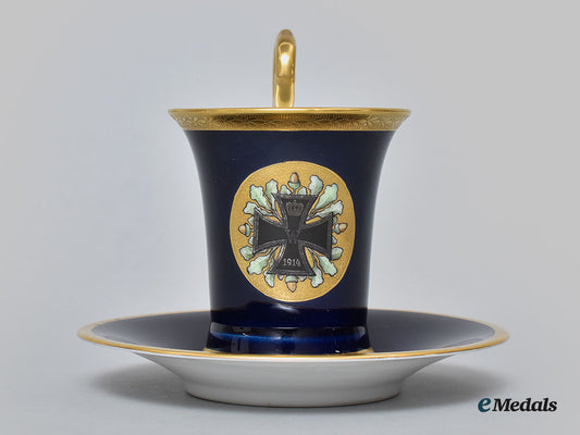 germany,_imperial._a_blue_glazed_teacup_and_saucer_with_iron_cross_depiction,_by_pt_tirschenreuth,_c.1930_l22_mnc9322_640_1