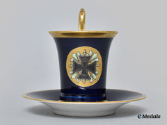 Germany, Imperial. A Blue Glazed Teacup And Saucer With Iron Cross Depiction, By Pt Tirschenreuth, C.1930