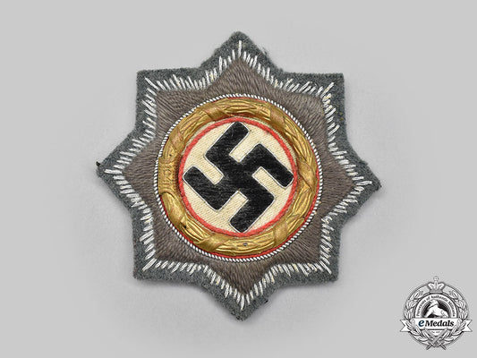 germany,_wehrmacht._a_german_cross_in_gold,_cloth_version_for_assault_gun_troops,_with_dietrich_maerz_certification_l22_mnc9340_637_1