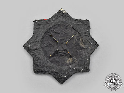 germany,_wehrmacht._a_german_cross_in_gold,_cloth_version_for_assault_gun_troops,_with_dietrich_maerz_certification_l22_mnc9341_638_1