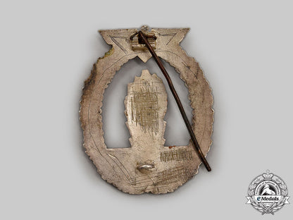 germany,_kriegsmarine._a_minesweeper_war_badge,_by_rudolf_karneth&_söhne,_with_photos_l22_mnc9386_086