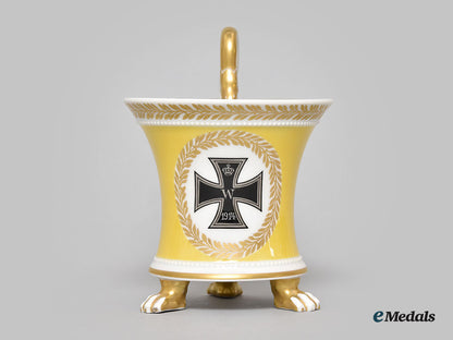 germany,_imperial._a_yellow_glazed_kpm_clawfoot_cup_with_iron_cross_motif_l22_mnc9387_611