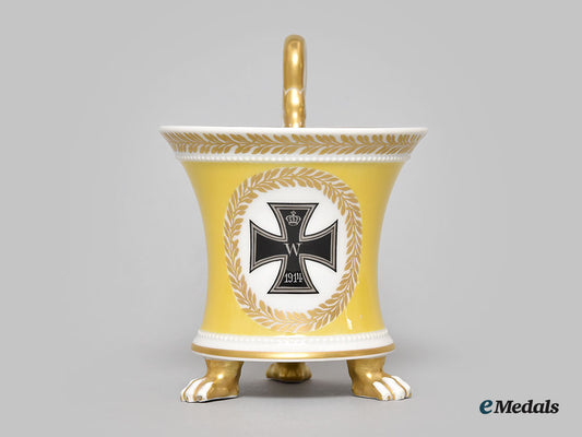 germany,_imperial._a_yellow_glazed_kpm_clawfoot_cup_with_iron_cross_motif_l22_mnc9387_611