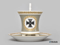 Germany, Imperial. A Grey Glazed Clawfoot Iron Cross Motif Teacup Set, By Kpm