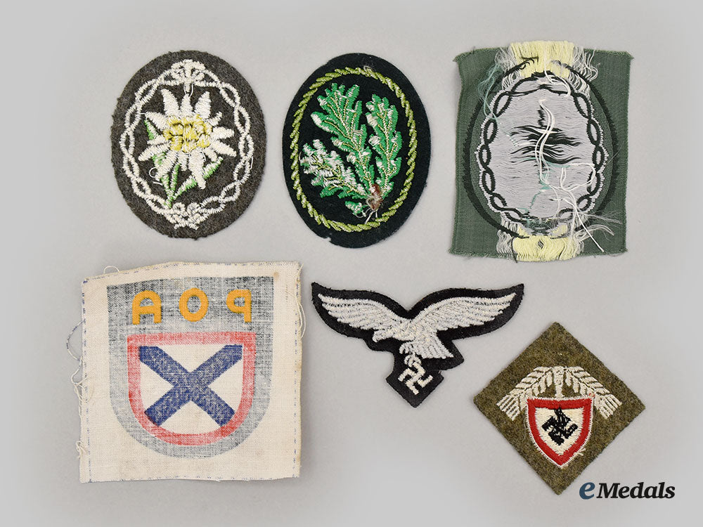 germany,_wehrmacht._a_mixed_lot_of_uniform_insignia_l22_mnc9396_460
