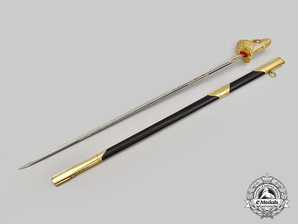spain,_spanish_state._an_officer’s_naval_sword_from_the_estate_of_general_francisco_franco_by_artilleria_fabrica_de_toledo_l22_mnc9465_696