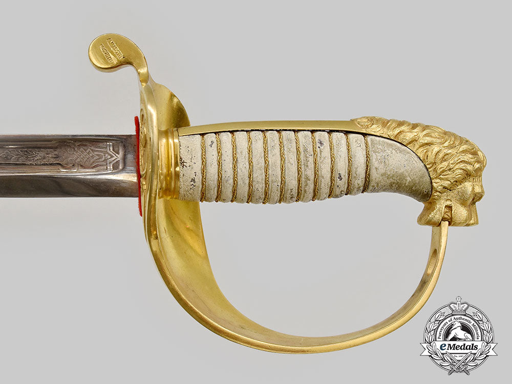 spain,_spanish_state._an_officer’s_naval_sword_from_the_estate_of_general_francisco_franco_by_artilleria_fabrica_de_toledo_l22_mnc9468_698