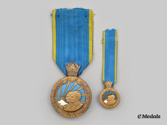 iran,_pahlavi_dynasty._a_medal_for_the_fiftieth_anniversary_of_the_pahlavi_dynasty1976,_fullsize_and_miniature_l22_mnc9514_628