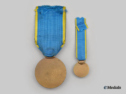 iran,_pahlavi_dynasty._a_medal_for_the_fiftieth_anniversary_of_the_pahlavi_dynasty1976,_fullsize_and_miniature_l22_mnc9517_630