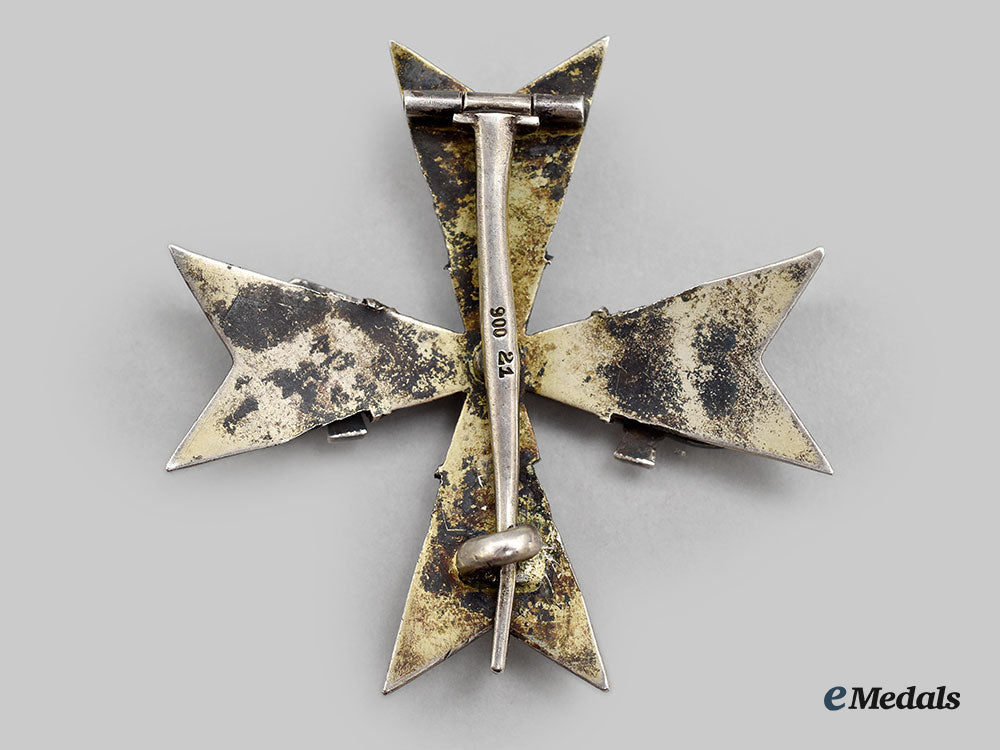 germany,_nsdap._an_order_of_the_german_eagle,_iv_class_breast_star_with_swords_by_gebrüder_godet,_modified_for_postwar_wear_l22_mnc9561_122
