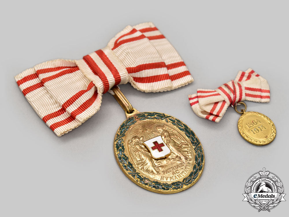 austria,_empire._an_honour_decoration_of_the_red_cross,_bronze_grade_medal_with_war_decoration_for_ladies,_fullsize_and_miniature_l22_mnc9751_831