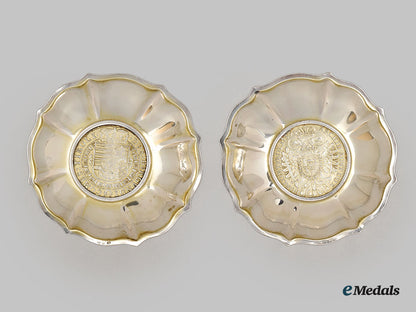 austria,_empire._two_silver_dishes_embedded_with_coins_of_holy_roman_emperor_charles_vi&_archduke_leopold_v._l22_mnc9835_649_1