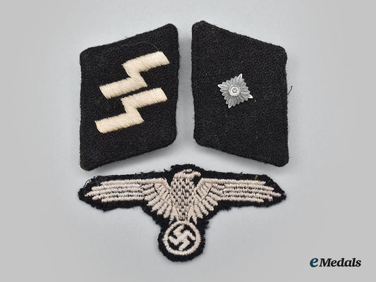 germany,_ss._a_mixed_lot_of_latvian-_made_waffen-_ss_volunteer_insignia,_from_the_roger_bender_collection_l22_mnc9907_854_1