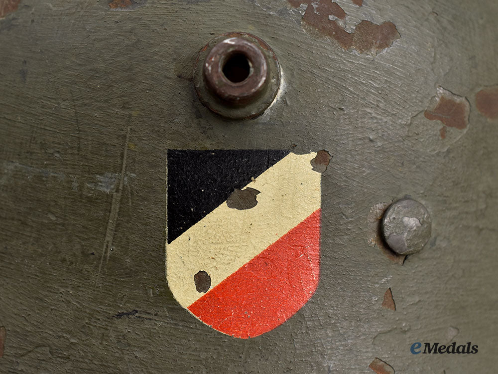 germany,_heer._an_m16_transitional_steel_helmet,_named_and_unit-_attributed_l22l22_mnc0655_615_794_1