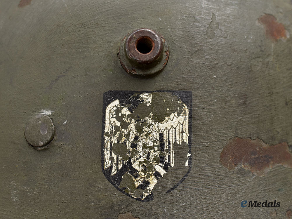 germany,_heer._an_m16_transitional_steel_helmet,_named_and_unit-_attributed_l22l22_mnc0657_617_796_1
