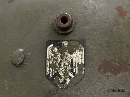 germany,_heer._an_m16_transitional_steel_helmet,_named_and_unit-_attributed_l22l22_mnc0657_617_796_1