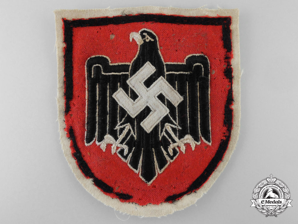 a1936_breast_insignia_for_the_german_olympic_team_l_249