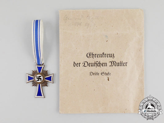 a3_rd_class_cross_of_honour_of_the_german_mother_in_its_packet_of_issue_l_422_1