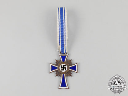 a3_rd_class_cross_of_honour_of_the_german_mother_in_its_packet_of_issue_l_423_1
